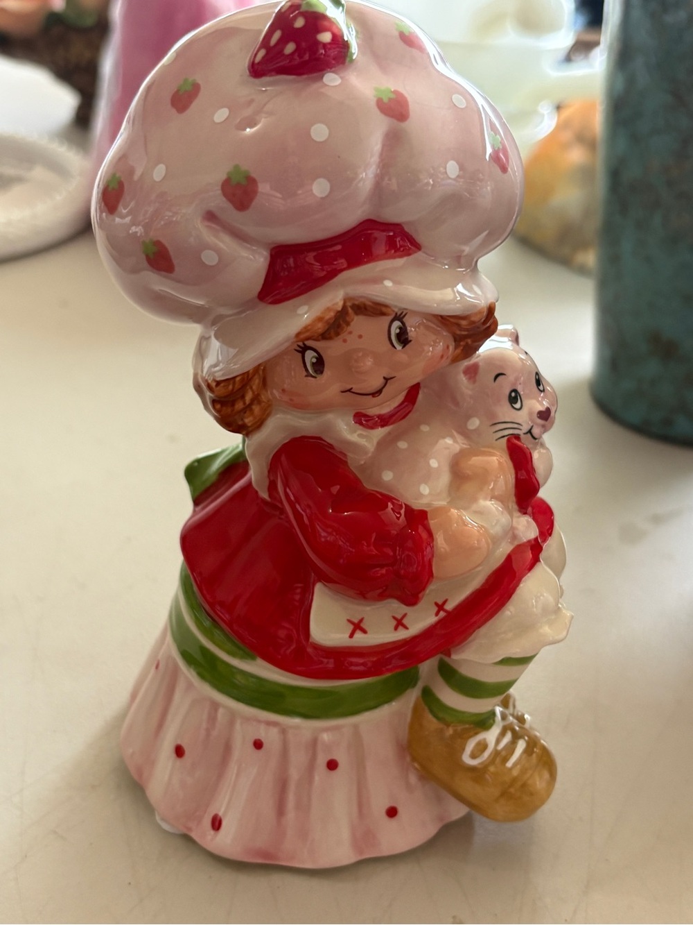 Blue Sky Pink Strawberry Girl Ceramic Figurine with Red and Green Accents
